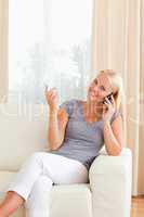 Portrait of a smiling woman on the phone