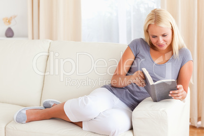 Close up of a woman reading a book