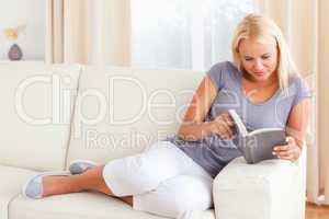 Close up of a woman reading a book