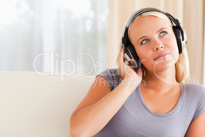 Close up of a woman listening to music