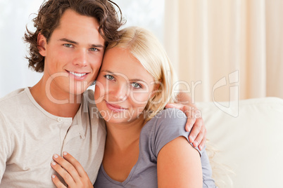 Lovely couple sitting on a couch