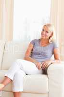 Woman sitting on a sofa