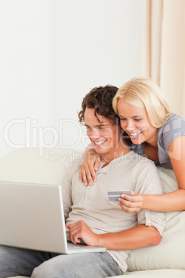 Portrait of a couple shopping online