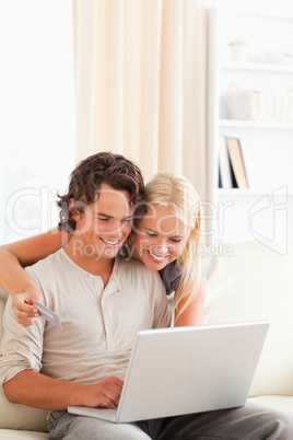 Portrait of a couple purchasing online