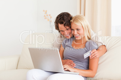 Lovely couple shopping online