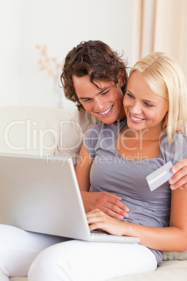 Portrait of a lovely couple shopping online