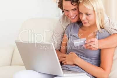 Lovely couple buying online