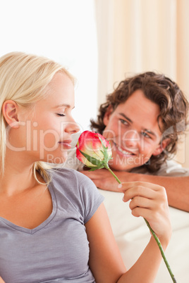 Portrait of a couple with a flower