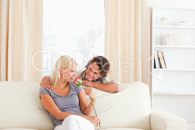 Lovely couple with a flower