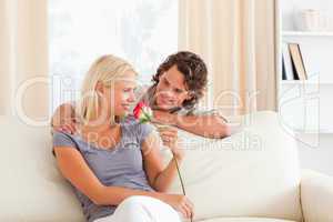 Cute couple with a flower