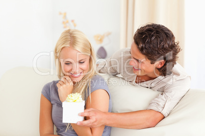 Man offering a present to his fiance
