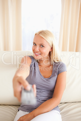 Portrait of a woman watching TV
