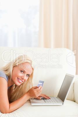 Portrait of a smiling woman purchasing online