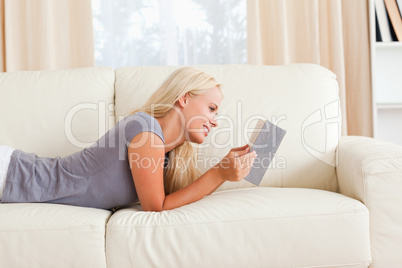 Serene woman reading a book