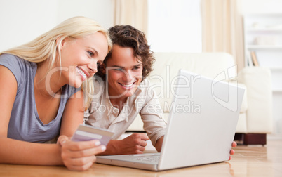 Close up of couple purchasing online
