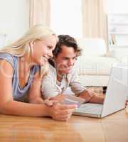 Cute couple purchasing online