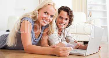 Couple booking their holidays online