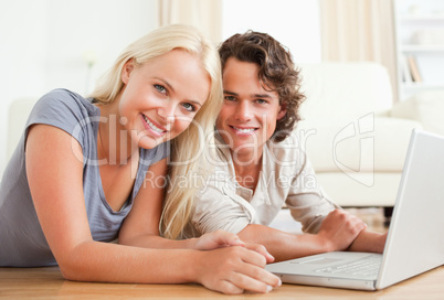 Close up of a couple with a laptop