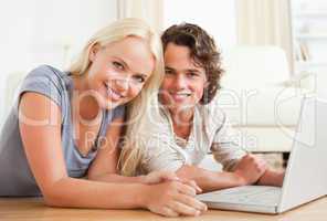 Close up of a couple with a laptop