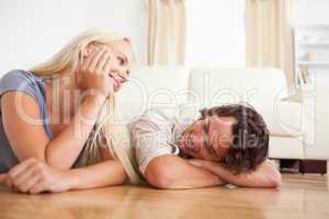 Couple lying on the floor