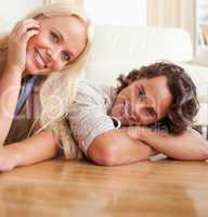 Close up of a couple lying on the floor