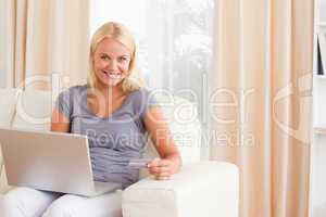 Blonde woman purchasing online