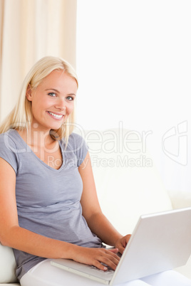 Portrait of a lovely woman with a laptop