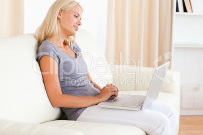 Lovely woman using a laptop