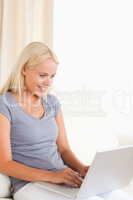 Portrait of a lovely woman using a laptop