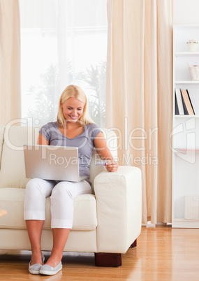 Portrait of smiling woman purchasing online