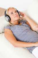 Portrait of a gorgeous woman enjoying some music