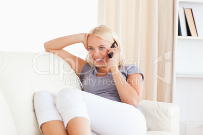 Blonde woman making a phone call
