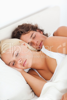 Young couple sleeping