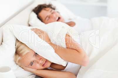 Woman awaken by her husband's snoring