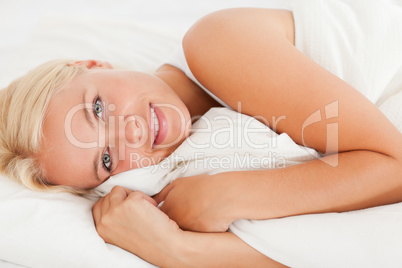 Smiling woman waking up