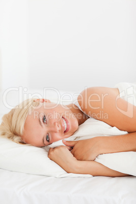 Portrait of a smiling woman waking up