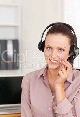 Red-haired woman with headset