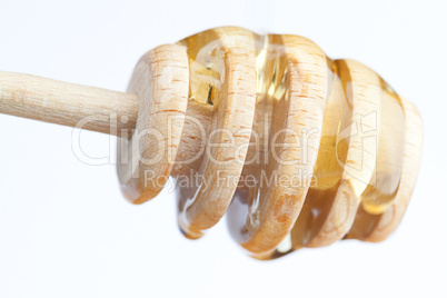 delicious Belgian waffles and stick to honey isolated on white