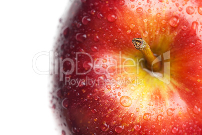 apple with water drops isolated on white
