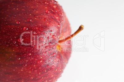 apple with water drops isolated on white