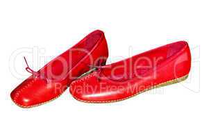 Frauenbeine mit roten Schuhen