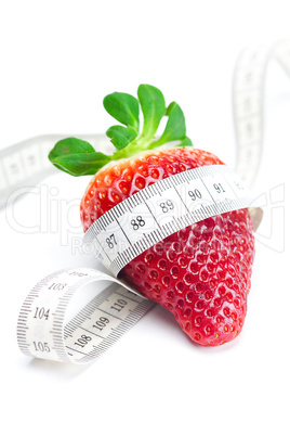 big juicy red ripe strawberries and measure tape isolated on whi