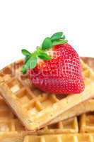 big juicy ripe strawberries and waffles isolated on white