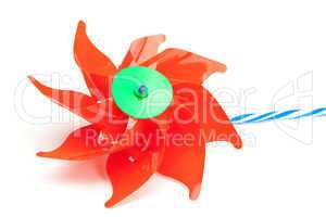 toy red windmill isolated on white