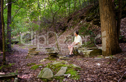 Senior hiker in woods in Virginia