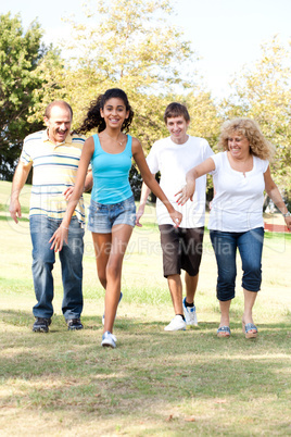 Family having fun in summer park