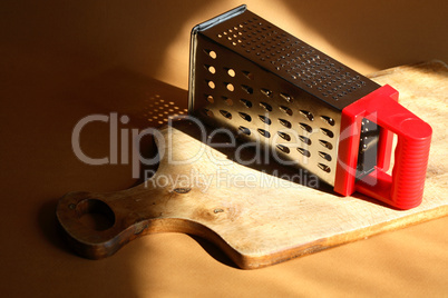 Grater On Cutting Board