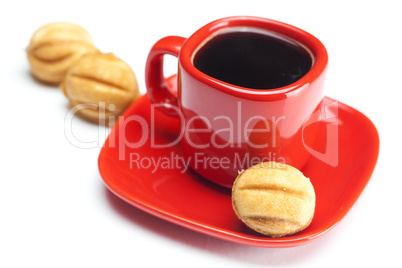 cup with coffee and cake nut isolated on white