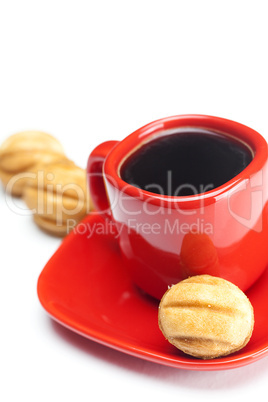 cup with coffee and cake nut isolated on white