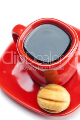 cup with coffee and cake nut isolated on white